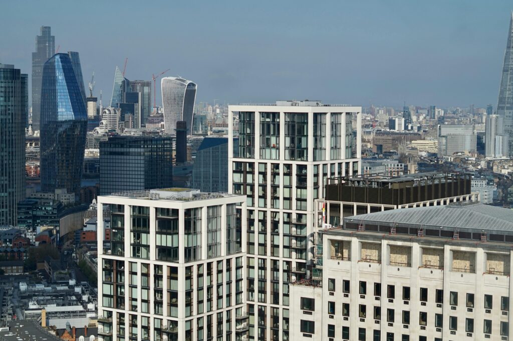 Stunning aerial photograph showcasing London's skyline with modern skyscrapers and iconic landmarks.